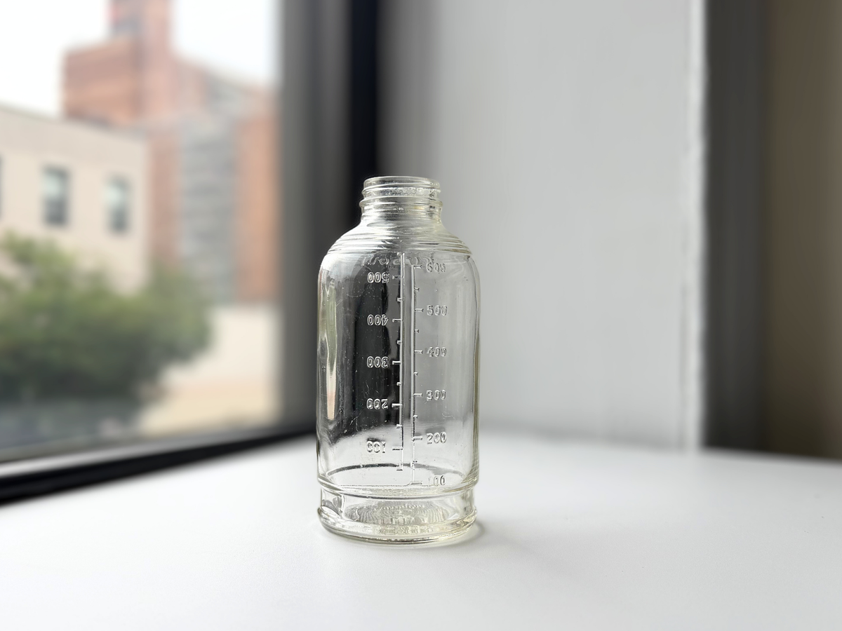 Abbott Laboratories Duraglas clear glass bottle displayed on a windowsill, 1942.