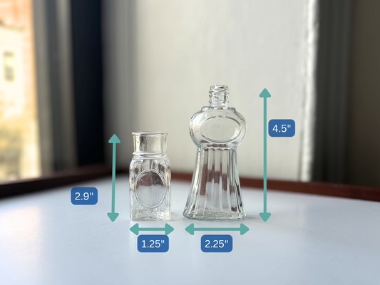 Dimensions of the Helena Rubinstein Heaven Sent perfume bottle at 4.5 inches tall and the Kerkoff Djer Kiss bottle at 2.9 inches tall