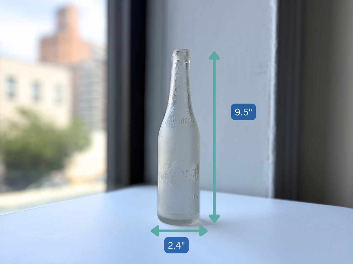 Dimensions of the sea-worn Hollywood soda bottle at 9.5 inches tall and 2.4 inches wide