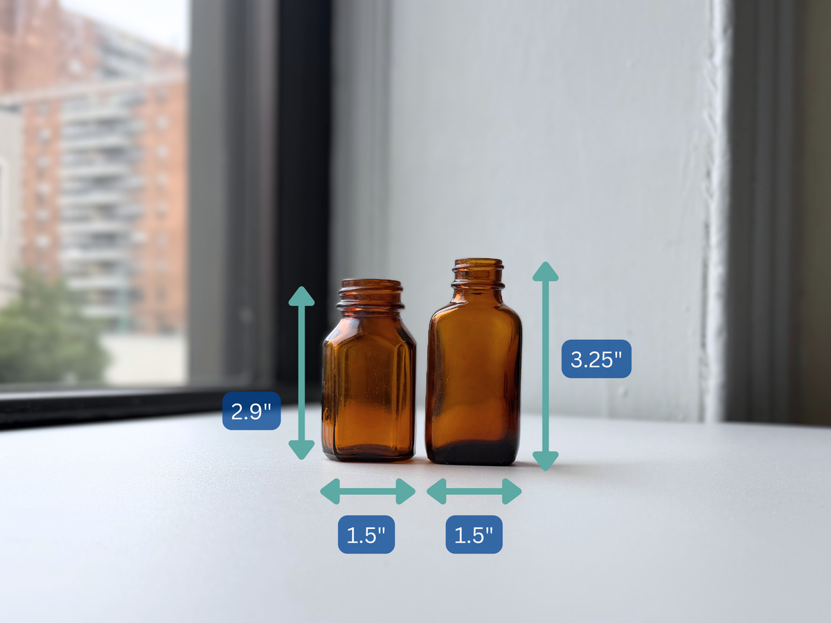 Amber glass bottle pair with dimension overlay showing height and width for each bottle.