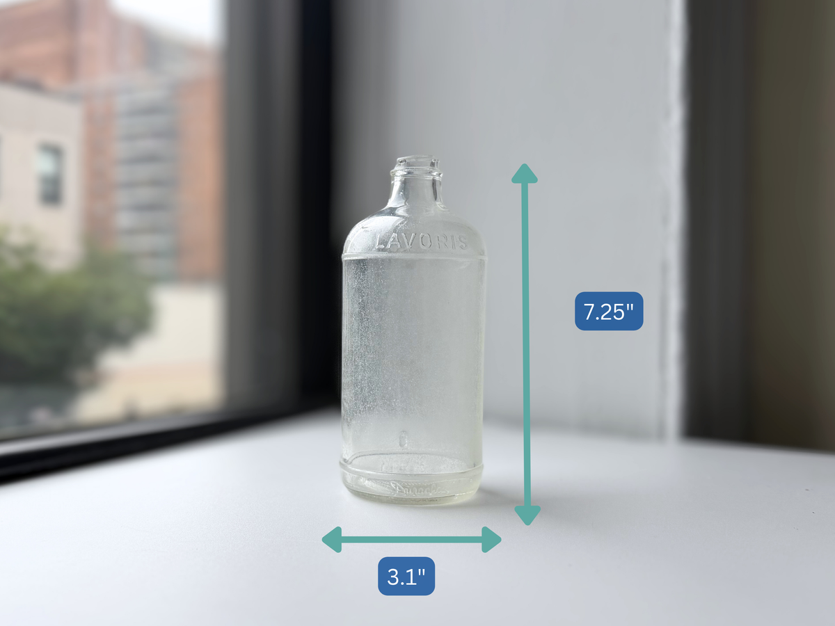 1952 Lavoris bottle with dimension overlay showing 7.25 inch height and 3.1 inch width.