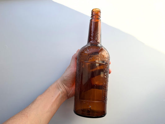 Vintage 1952 Lord Calvert whisky bottle with Made in USA marking. Excellent condition. Perfect for American whisky and vintage spirits collectors.