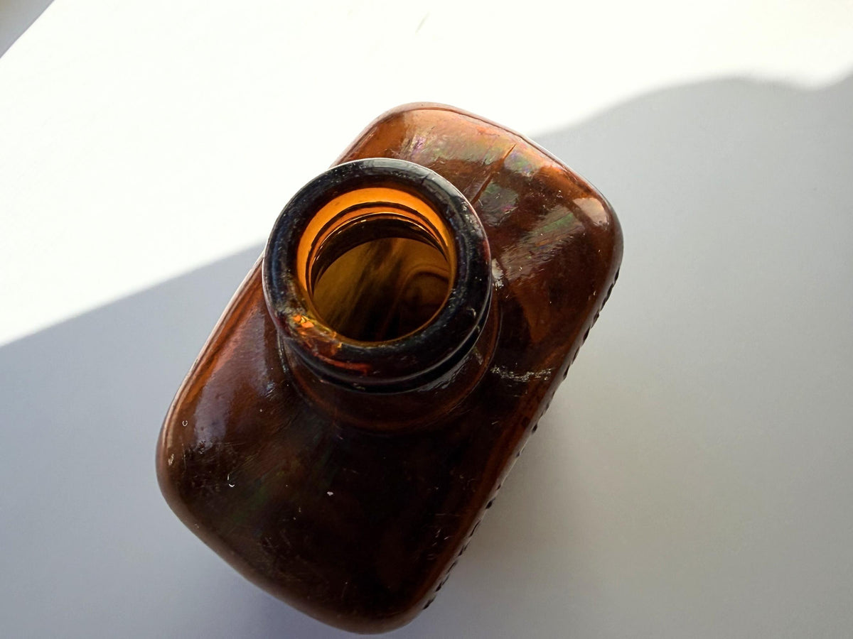 Vintage Bloch Brothers whisky bottle from Glasgow Scotland with distillery marking. Good condition showing minor scratches. Perfect for Scottish whisky collectors.