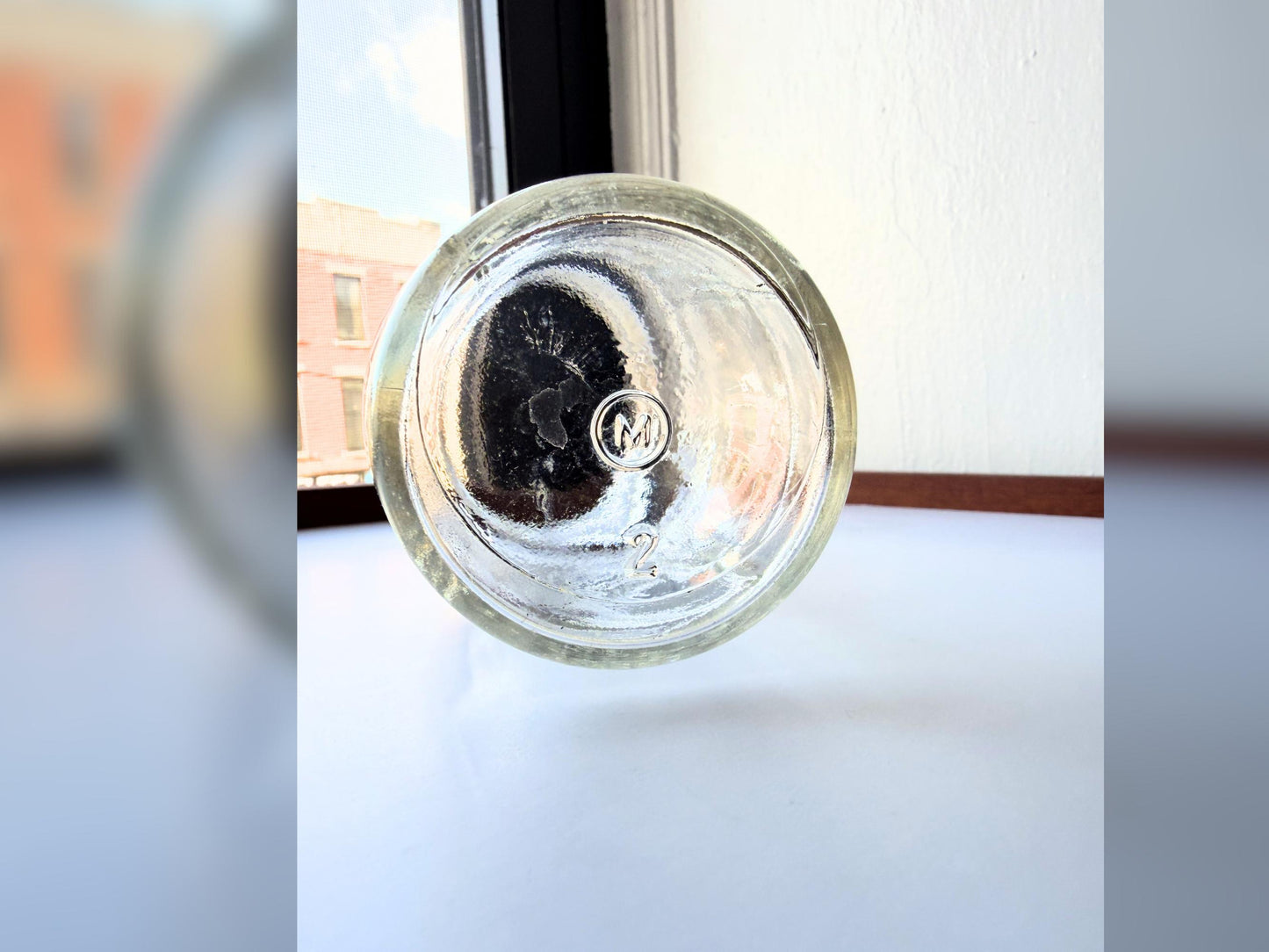 Vintage 1920s-1940s Kingfish Brand clear glass herring jar with bold embossed lettering from Evelyn Packing Company in New York. Perfect for windowsill displays, vintage kitchen collections, and farmhouse or cottagecore decor.
