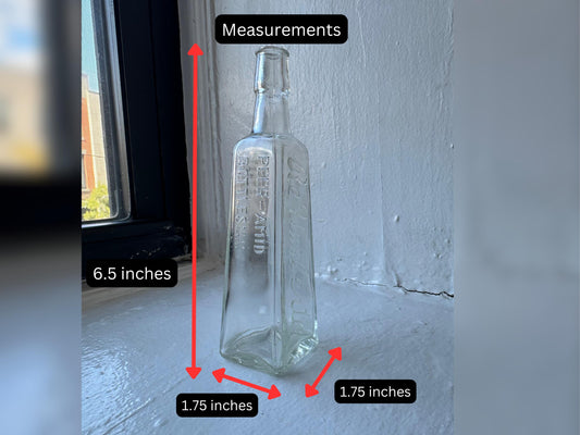 Vintage square glass Peer-Amid olive oil bottle, 6.5 inches tall and 1.75 inches wide at base. Perfect for farmhouse decor, kitchen display, or repurposing.