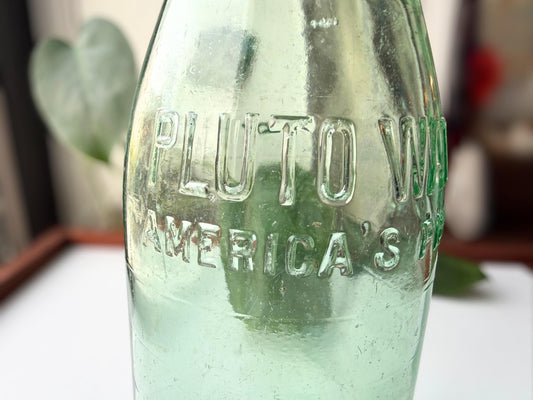 Vintage Pluto Water Bottle 1930s green glass side view – Brooklyn Sea Glass