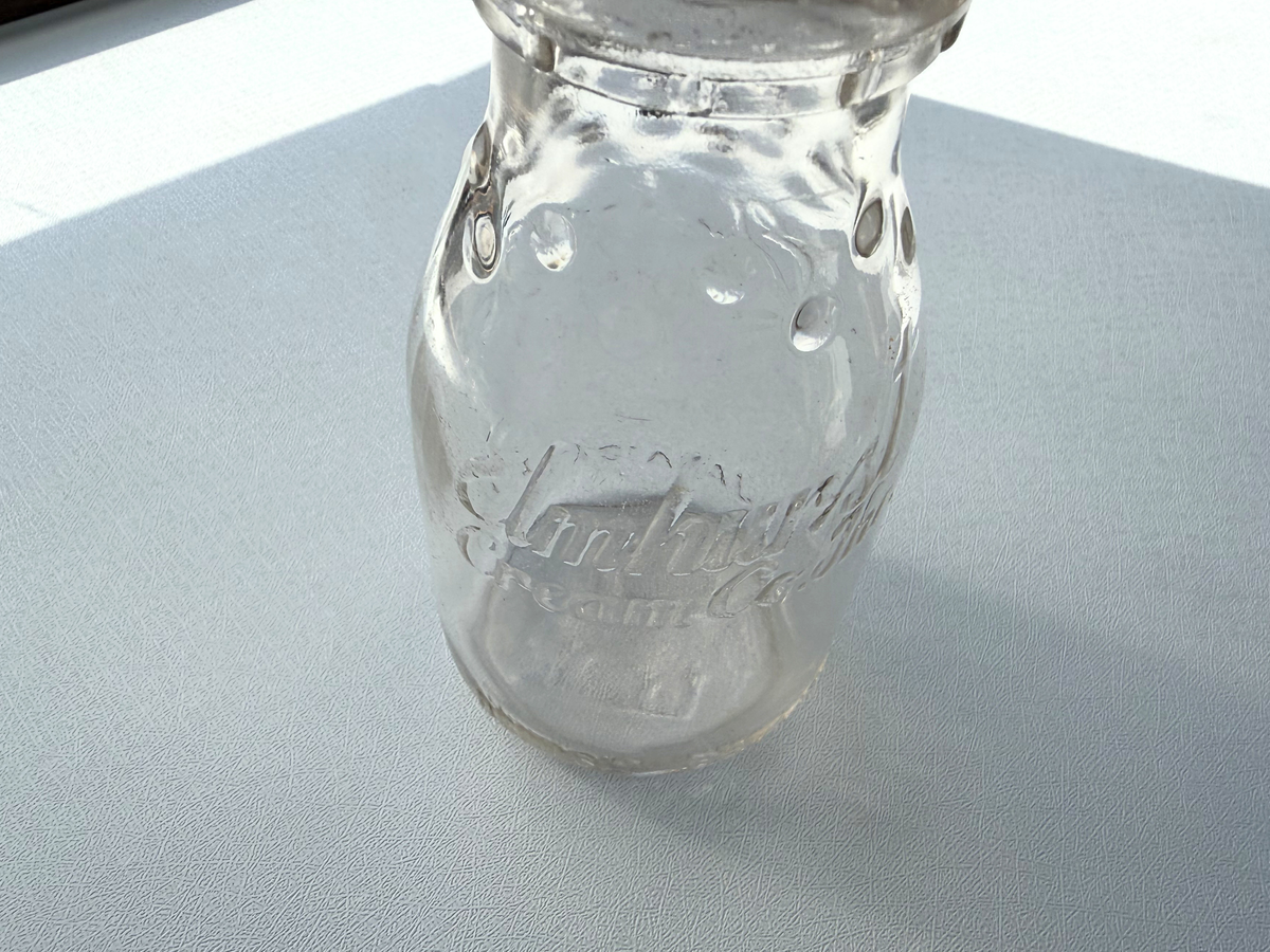 Elmhurst Cream Co. bottle base showing EC 53 date and dairy code confirming 1953 Elmhurst Cream production