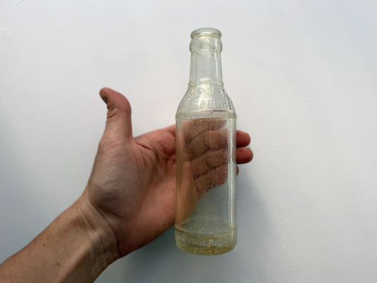 Manhattan Special soda bottle front embossing close-up, Brooklyn Williamsburg NYC vintage glass collectible