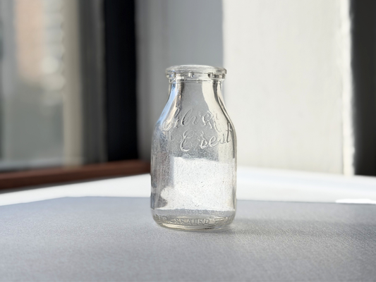 Silver Crest Dairy half pint milk bottle, Queens NY, angled view