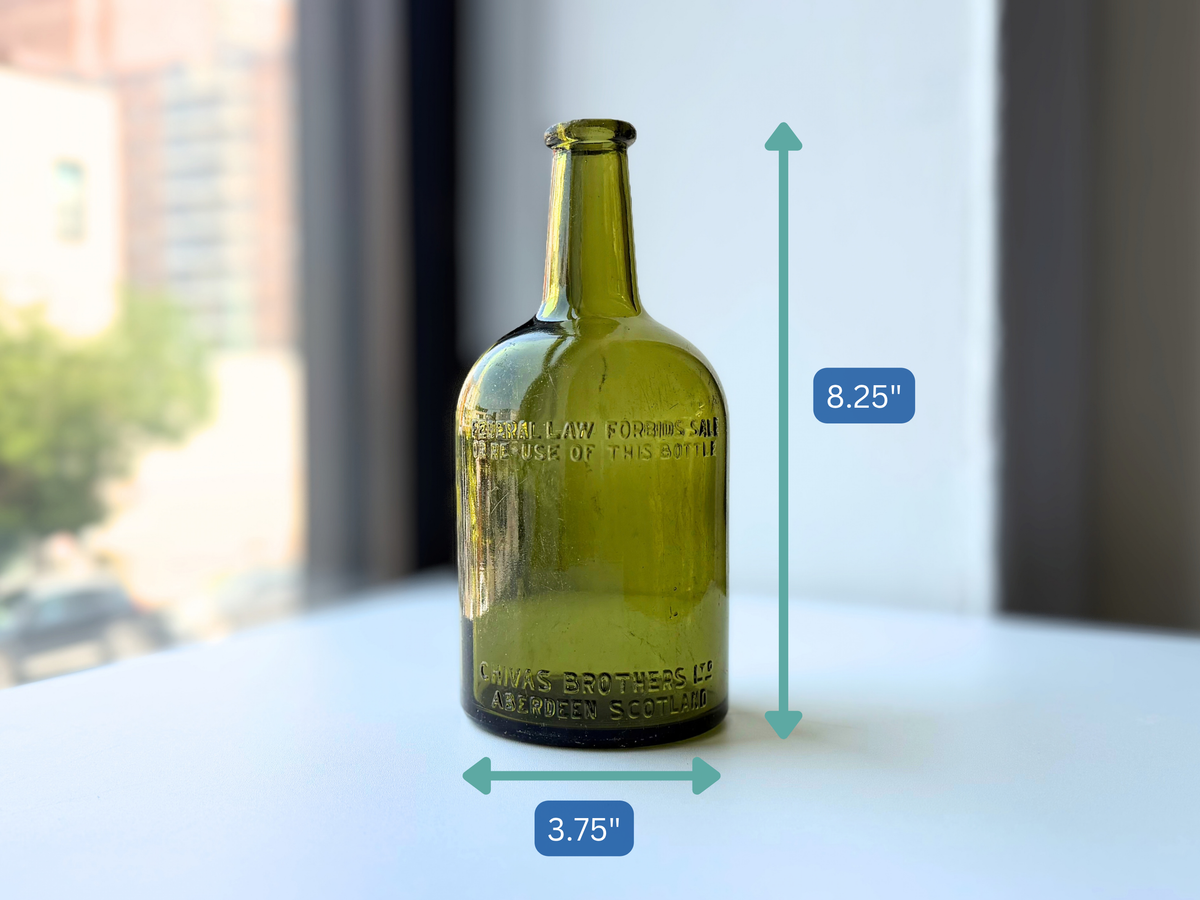Dimensions of the vintage Chivas Brothers green glass bottle at 8.25 inches tall and 3.75 inches wide
