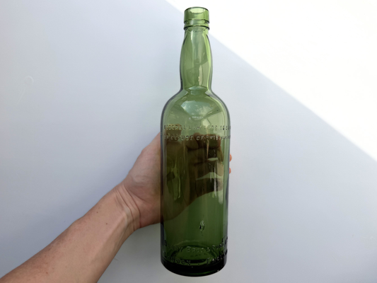 Berry Bros and Rudd green glass bottle top-down view showing mouth opening and clean green glass condition