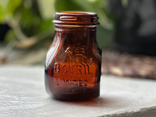 Bovril 2oz amber glass jar full front view, BOVRIL embossing on body, miniature British beef extract jar, NYC recovery