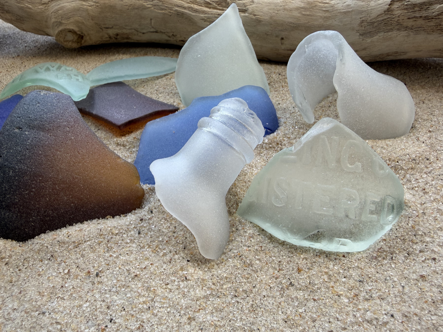 Large frosted sea glass pieces 2-3 inches with registered embossed marking, authentic NYC beach glass bottle shapes