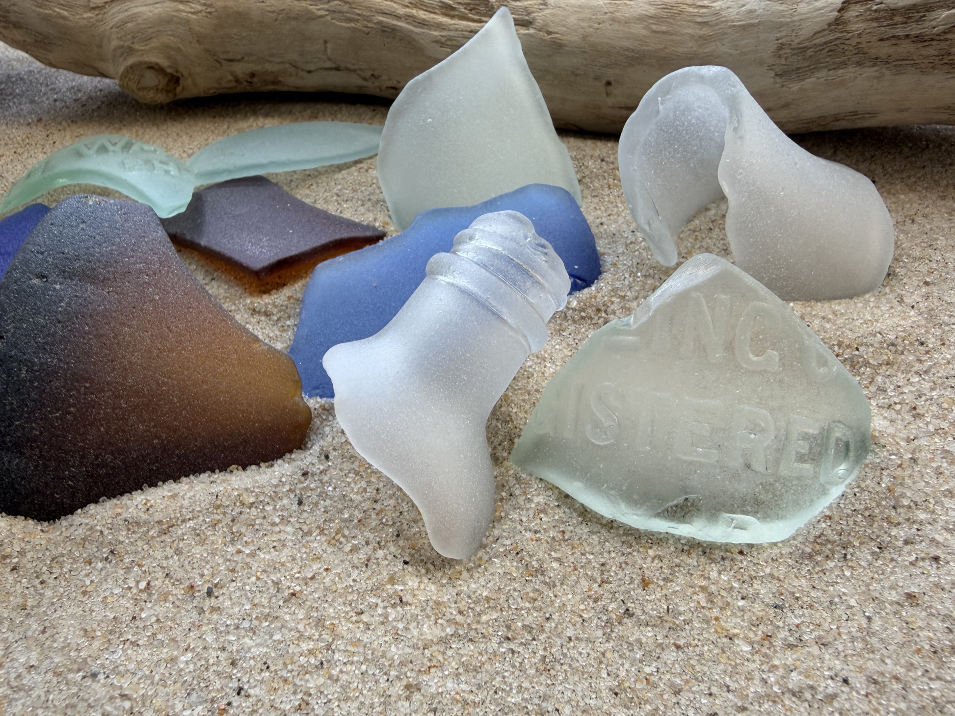 Large frosted sea glass pieces 2-3 inches with registered embossed marking, authentic NYC beach glass bottle shapes