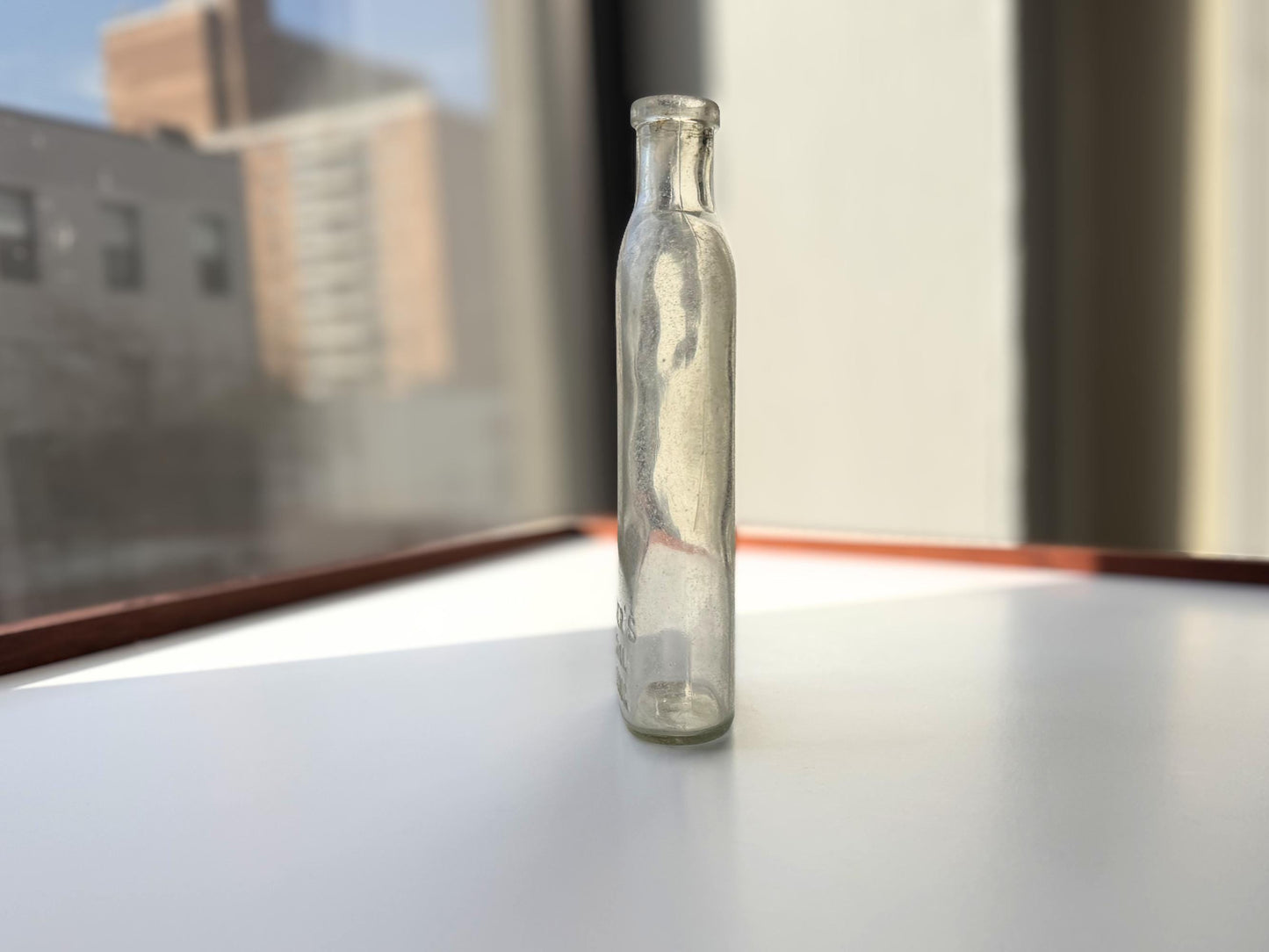 Vintage Sawyer's Crystal Blueing clear glass bottle 7.75 inches tall completely frosted by ocean exposure - Victorian era laundry product bottle hand-recovered from NYC beach