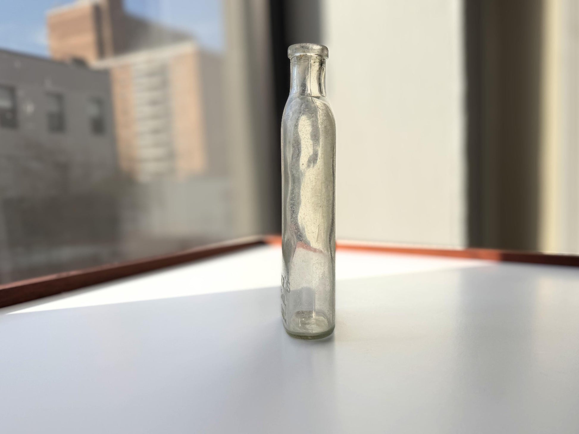 Vintage Sawyer's Crystal Blueing clear glass bottle 7.75 inches tall completely frosted by ocean exposure - Victorian era laundry product bottle hand-recovered from NYC beach