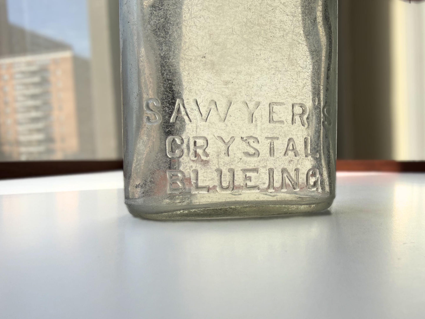Vintage Sawyer's Crystal Blueing clear glass bottle 7.75 inches tall completely frosted by ocean exposure - Victorian era laundry product bottle hand-recovered from NYC beach