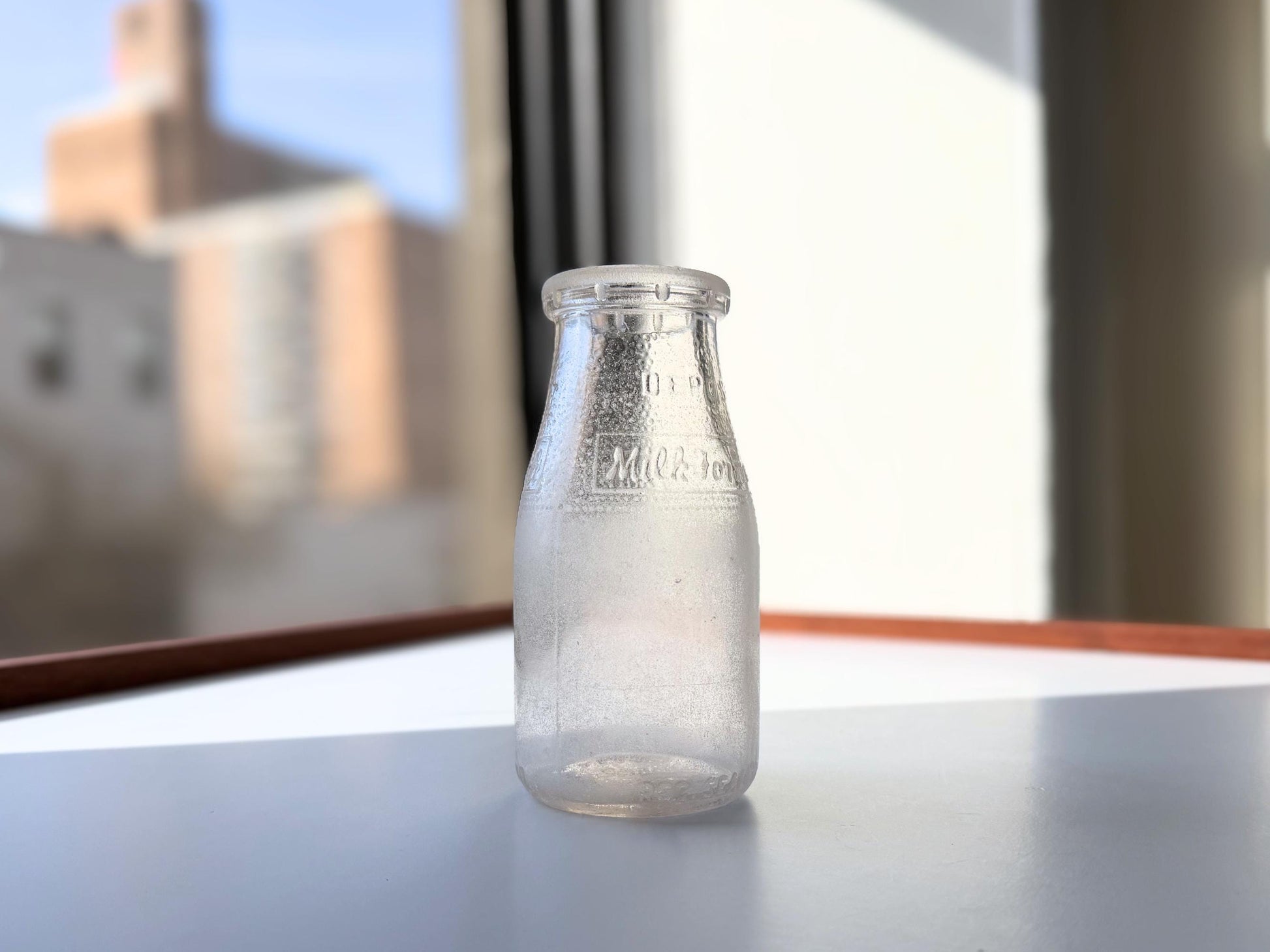 Vintage 1953 NYC Milk for Health half-pint bottle 5.25 inches tall completely frosted by ocean exposure - genuine sea-worn glass hand-recovered from NYC