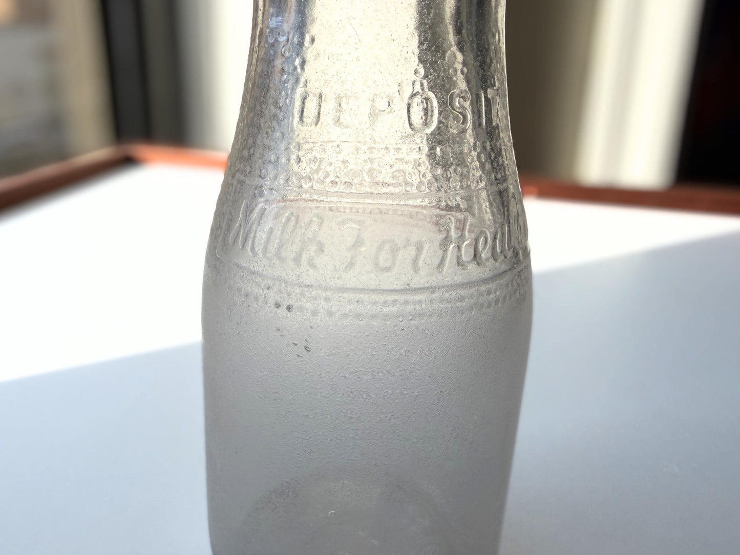 Vintage 1953 NYC Milk for Health half-pint bottle 5.25 inches tall completely frosted by ocean exposure - genuine sea-worn glass hand-recovered from NYC