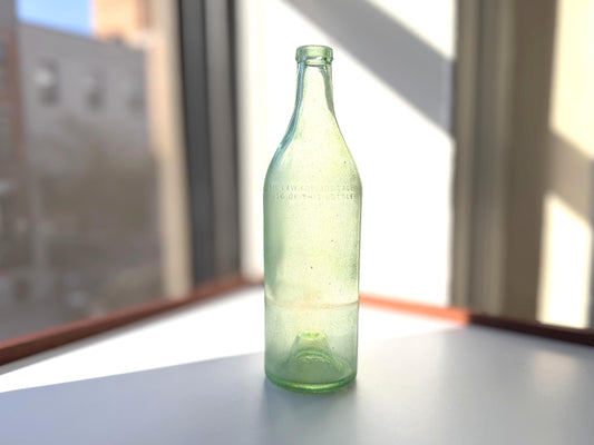 Vintage seaworn Bacardi rum bottle with beautiful frosted patina from ocean exposure. Minor chips showing authentic age. Perfect for sea glass and vintage spirits collectors.