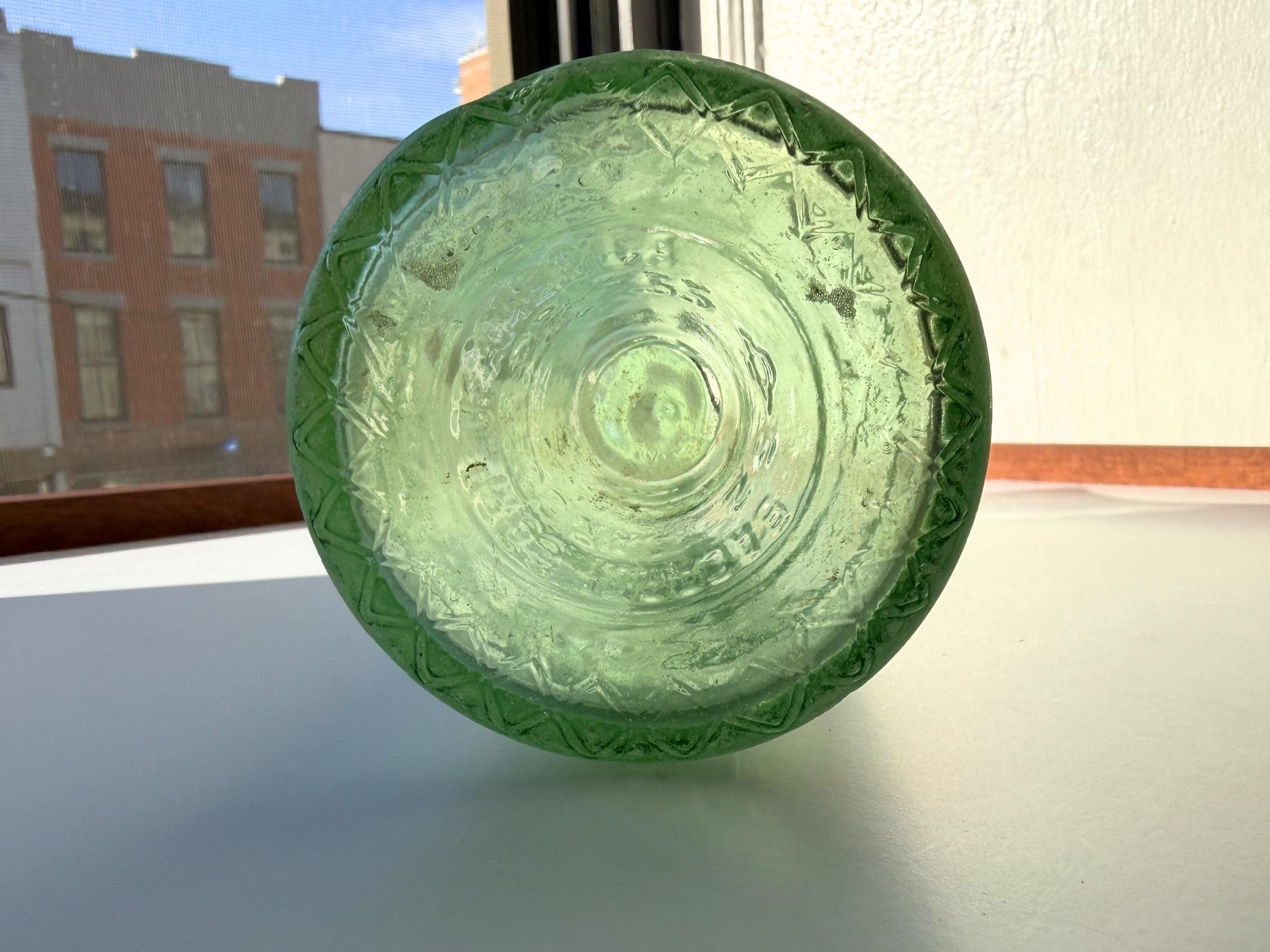 Vintage seaworn Bacardi rum bottle with beautiful frosted patina from ocean exposure. Minor chips showing authentic age. Perfect for sea glass and vintage spirits collectors.