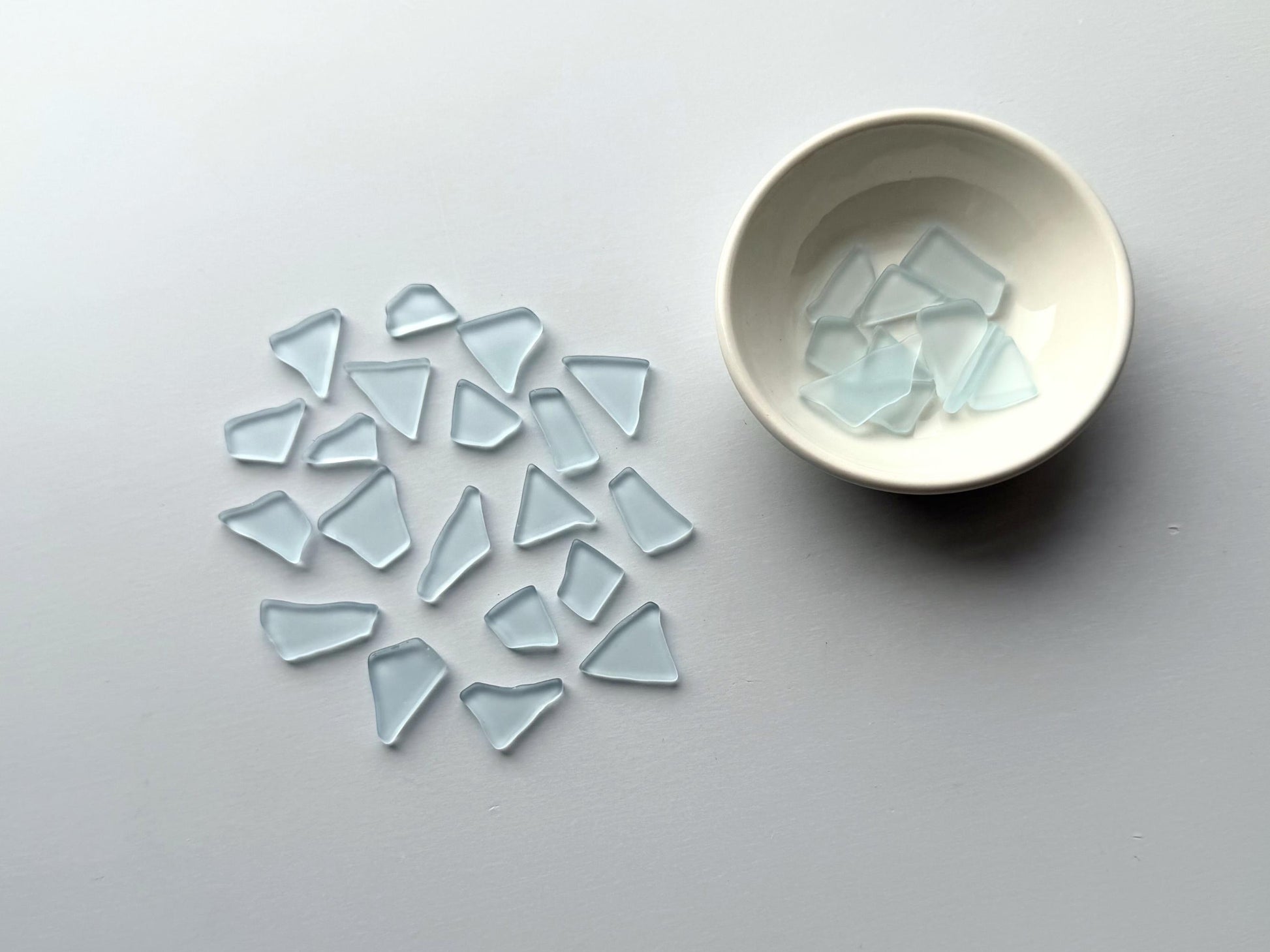 Spring sky blue tumbled sea glass pieces with smooth frosted edges in small to medium sizes perfect for spring jewelry making mosaics resin art coastal decor and nautical home accents made from recycled vintage glass