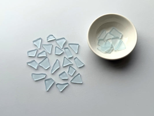 Spring sky blue tumbled sea glass pieces with smooth frosted edges in small to medium sizes perfect for spring jewelry making mosaics resin art coastal decor and nautical home accents made from recycled vintage glass
