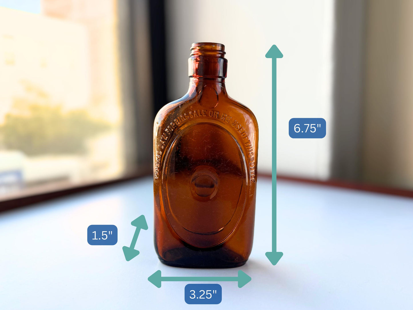 Vintage 1950s amber glass flask angle view – Brooklyn Sea Glass