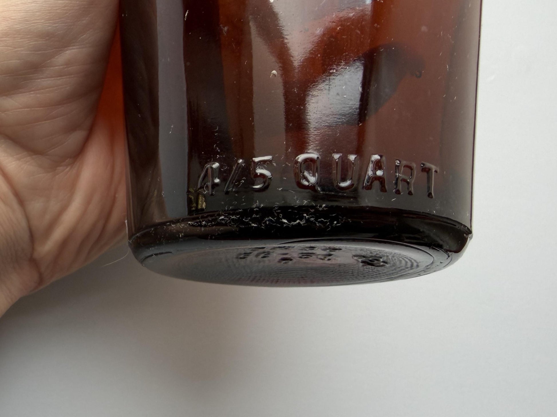 Vintage 1951 wide shoulder whisky bottle with distinctive shape and Owens Illinois marking. Excellent condition. Perfect for collectors of unusual bottle shapes.