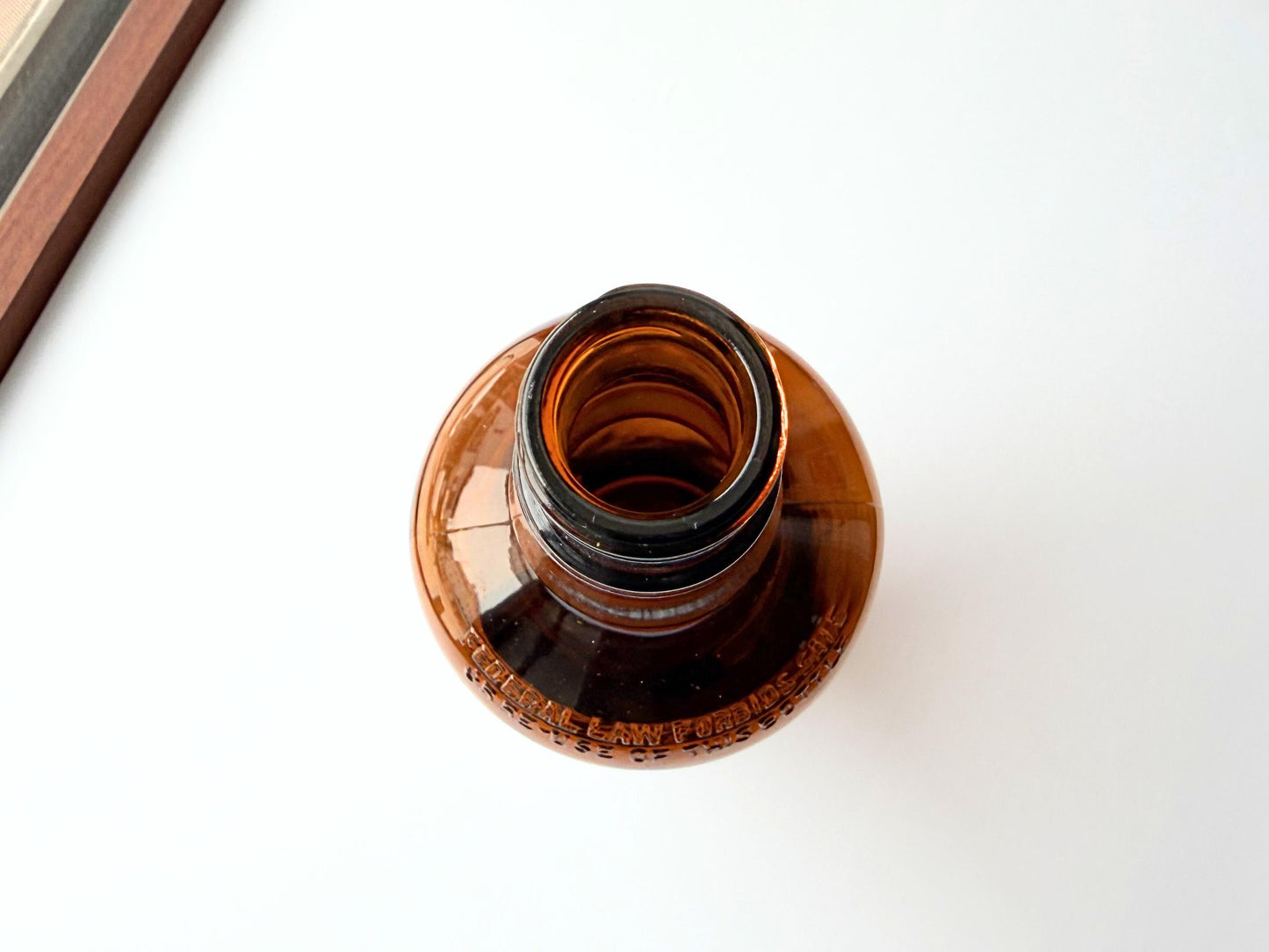 Vintage 1951 wide shoulder whisky bottle with distinctive shape and Owens Illinois marking. Excellent condition. Perfect for collectors of unusual bottle shapes.