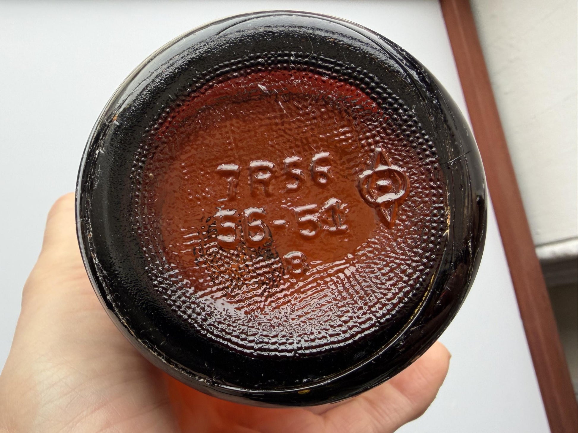 Vintage 1951 wide shoulder whisky bottle with distinctive shape and Owens Illinois marking. Excellent condition. Perfect for collectors of unusual bottle shapes.