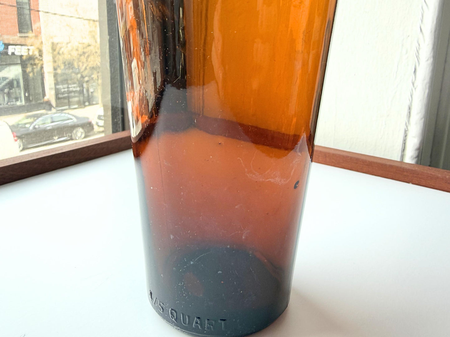 Vintage 1951 wide shoulder whisky bottle with distinctive shape and Owens Illinois marking. Excellent condition. Perfect for collectors of unusual bottle shapes.