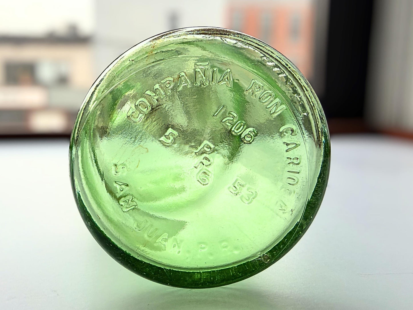 Vintage 1952 Compania Ron Carioca green glass rum bottle from San Juan Puerto Rico. 11.5 inches tall with Federal Law embossing – Brooklyn Sea Glass
