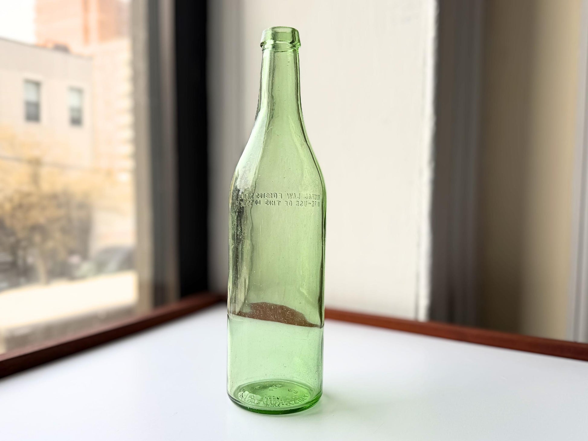 Vintage 1952 Compania Ron Carioca green glass rum bottle from San Juan Puerto Rico. 11.5 inches tall with Federal Law embossing – Brooklyn Sea Glass