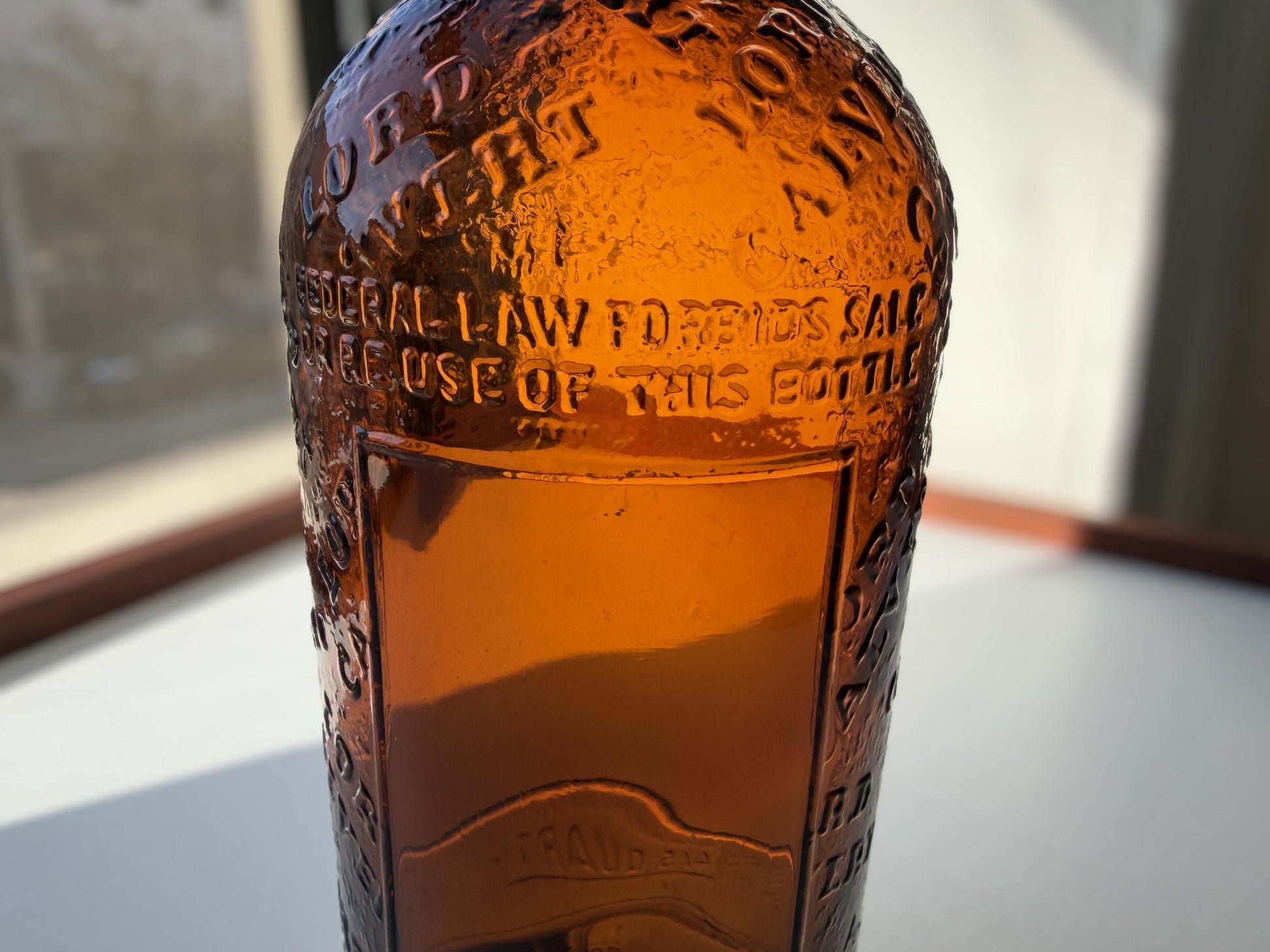 Vintage 1952 Lord Calvert whisky bottle with Made in USA marking. Excellent condition. Perfect for American whisky and vintage spirits collectors.