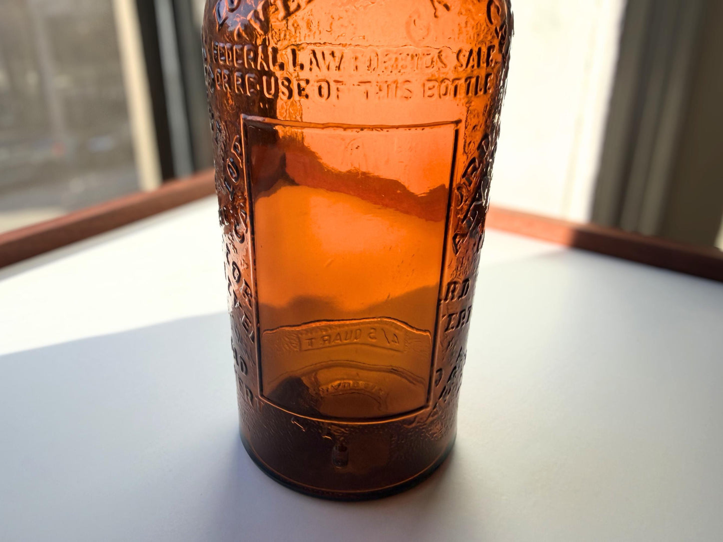 Vintage 1952 Lord Calvert whisky bottle with Made in USA marking. Excellent condition. Perfect for American whisky and vintage spirits collectors.