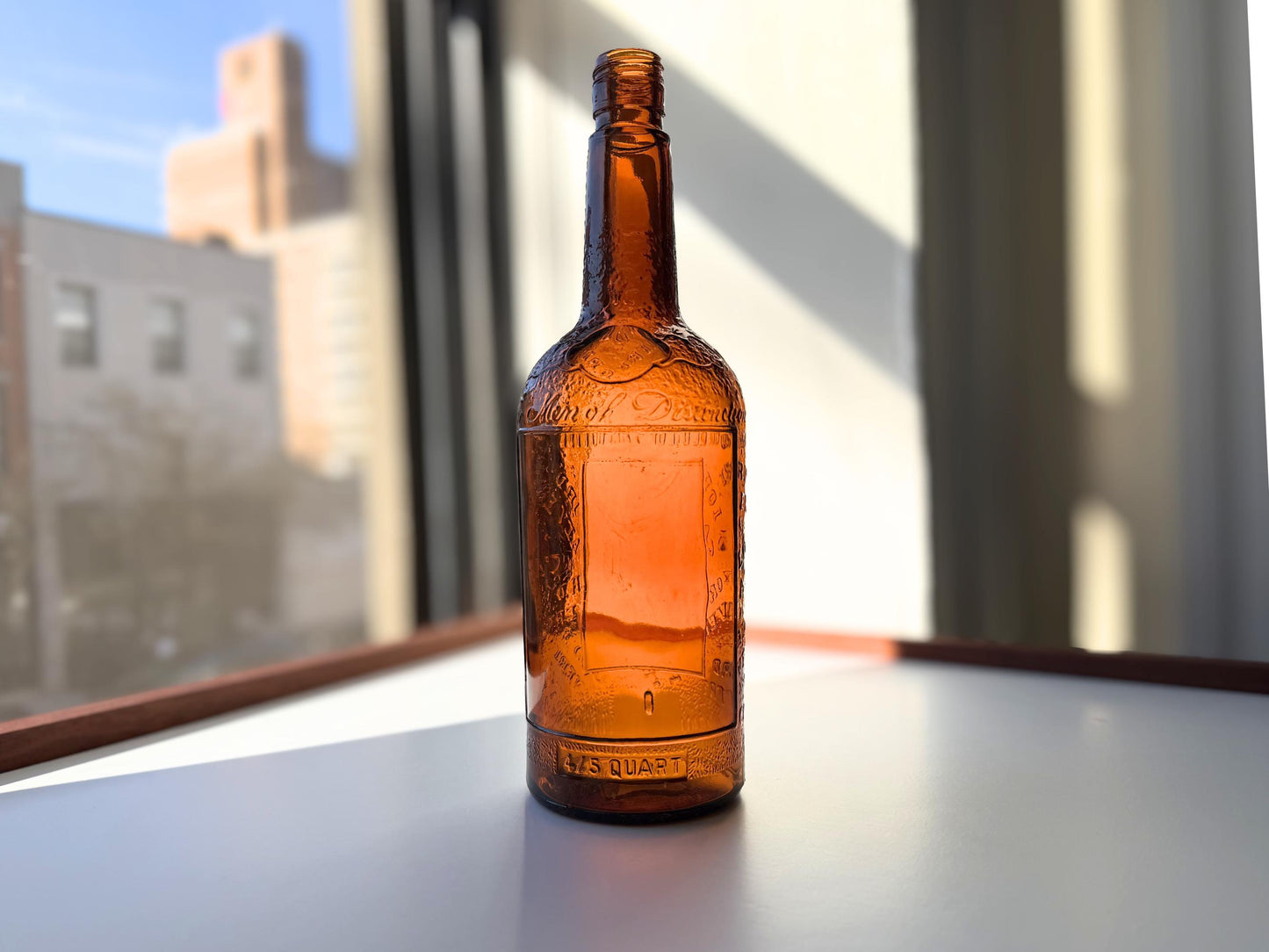 Vintage 1952 Lord Calvert whisky bottle with Made in USA marking. Excellent condition. Perfect for American whisky and vintage spirits collectors.