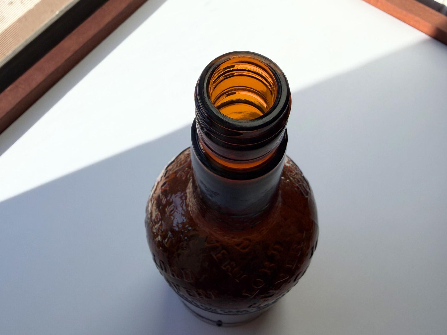 Vintage 1952 Lord Calvert whisky bottle with Made in USA marking. Excellent condition. Perfect for American whisky and vintage spirits collectors.