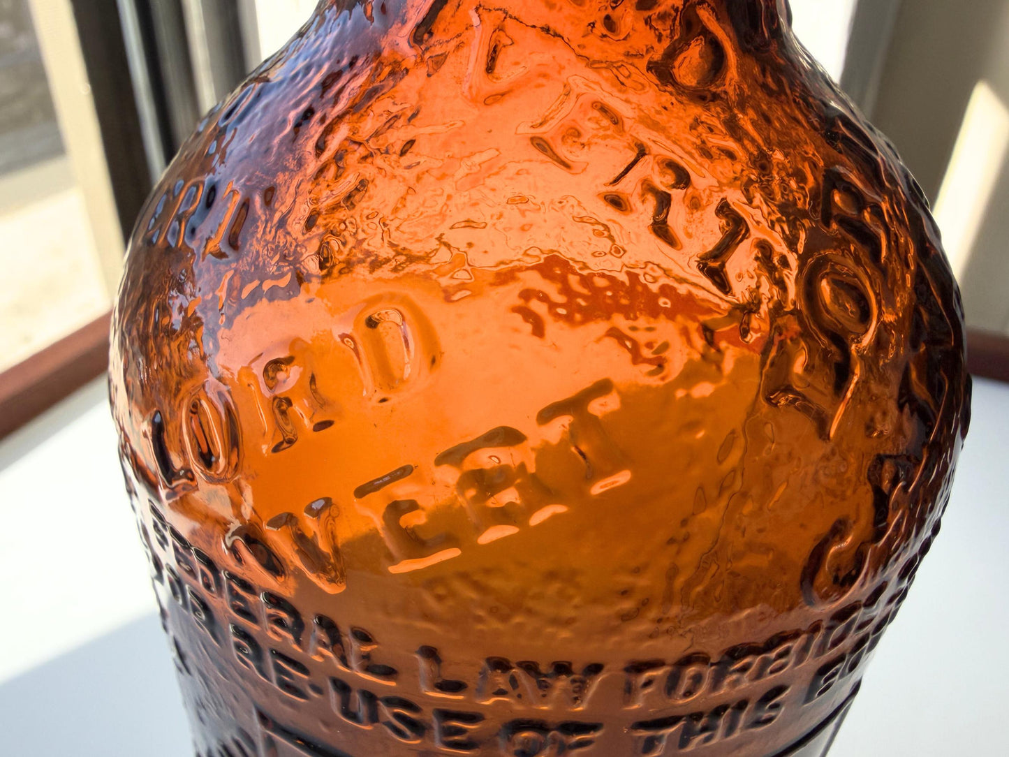 Vintage 1952 Lord Calvert whisky bottle with Made in USA marking. Excellent condition. Perfect for American whisky and vintage spirits collectors.