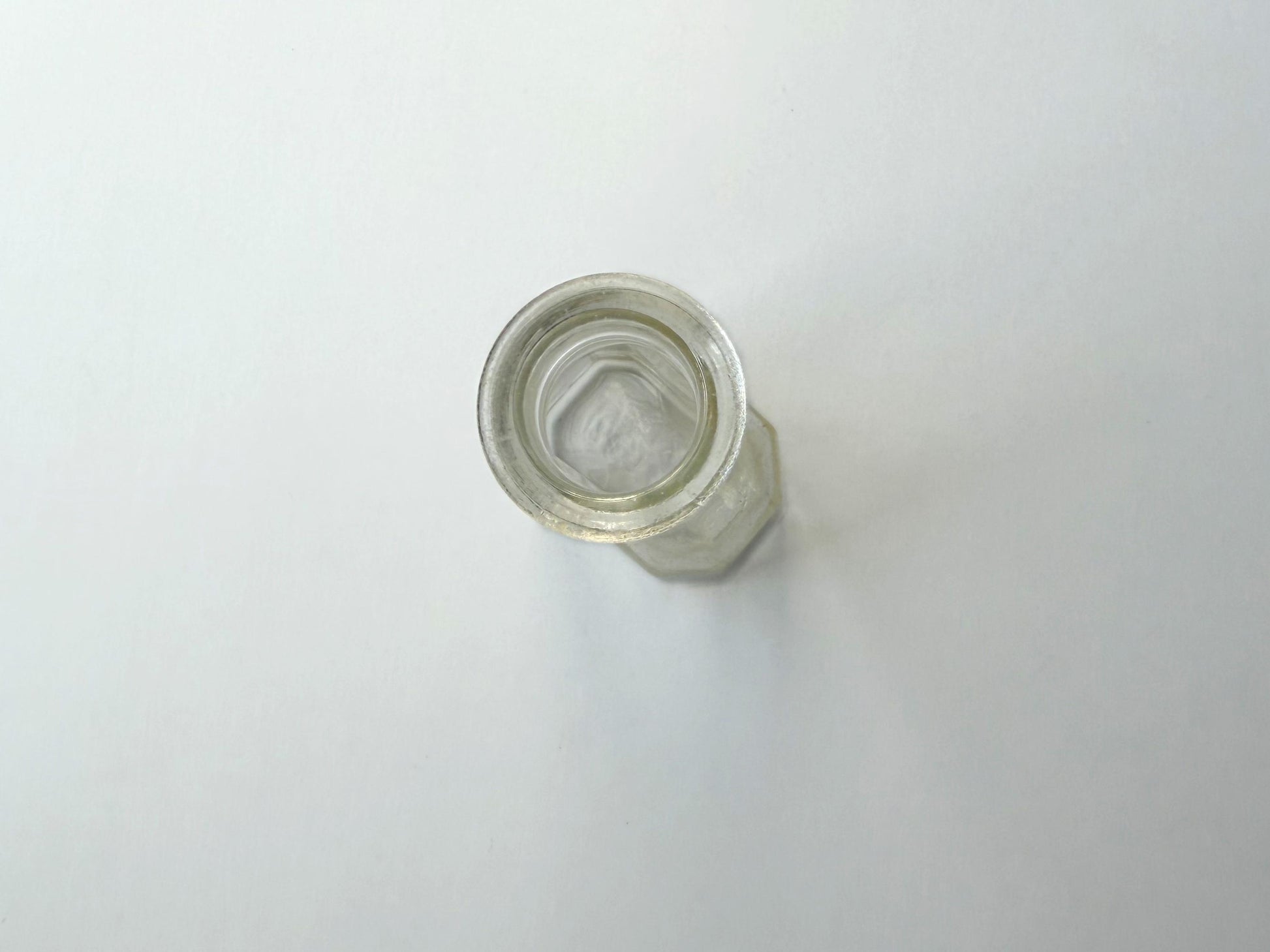 Vintage clear glass Ace shoe polish bottle 4.25 inches tall with bold ace-of-spades embossed logo - mid-century American collector piece hand-recovered from NYC