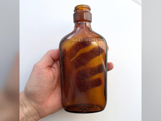 Vintage amber Federal Law flask 6.75 inches tall with beach-worn patina throughout - small chip on mouth - hand-recovered from NYC mid-century dumping grounds