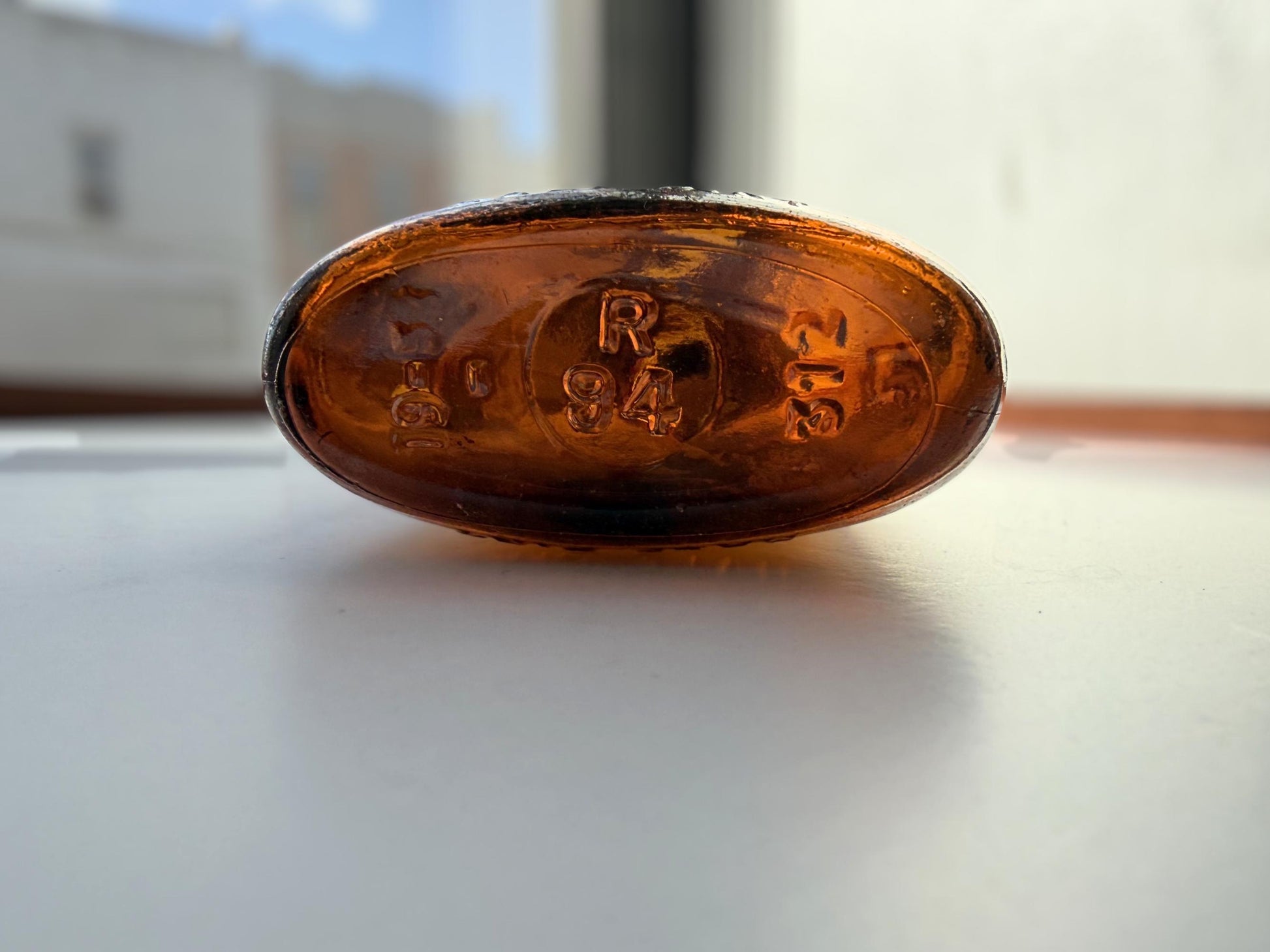 Vintage amber Federal Law flask 6.75 inches tall with beach-worn patina throughout - small chip on mouth - hand-recovered from NYC mid-century dumping grounds