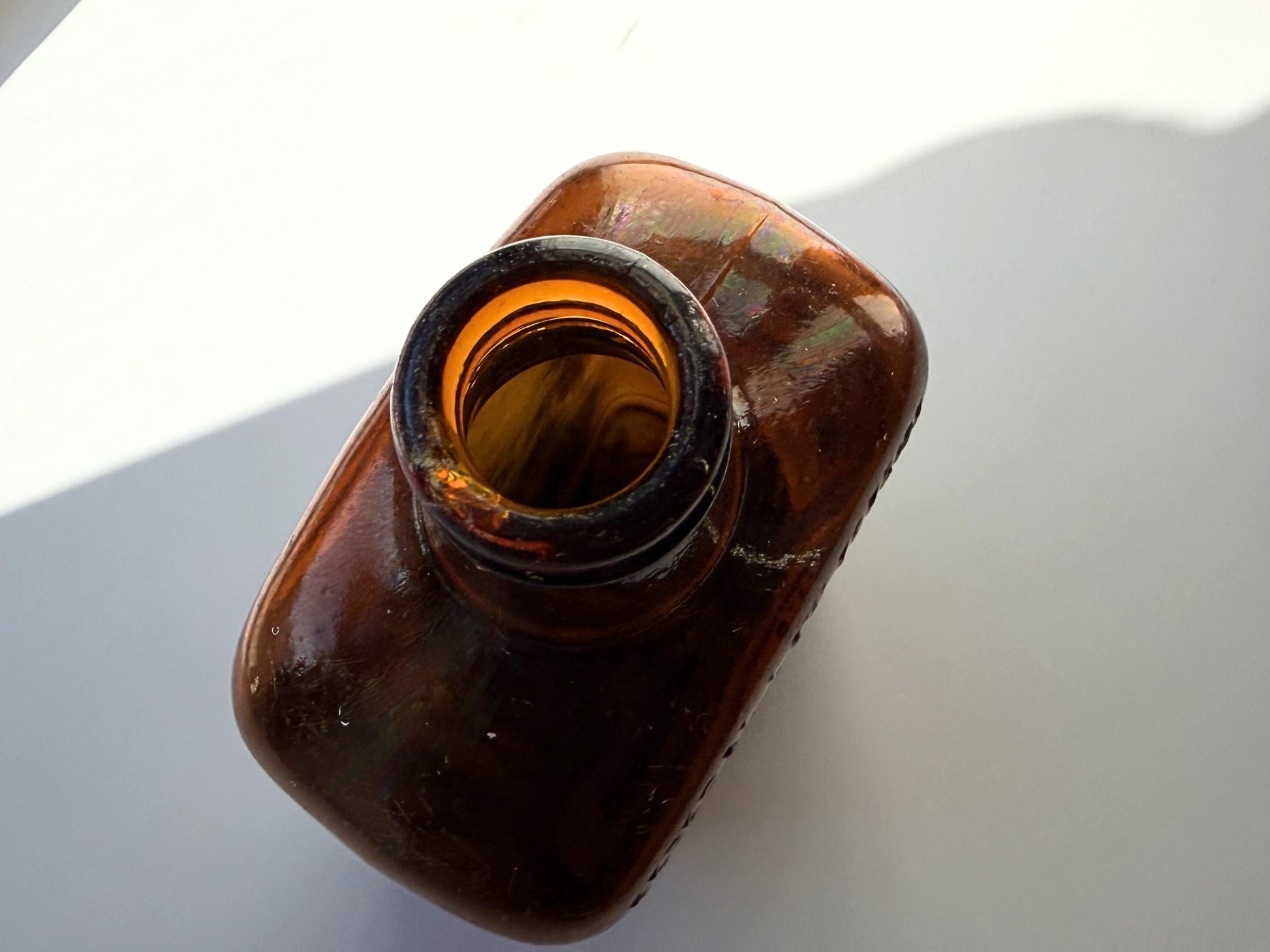 Vintage Bloch Brothers whisky bottle from Glasgow Scotland with distillery marking. Good condition showing minor scratches. Perfect for Scottish whisky collectors.