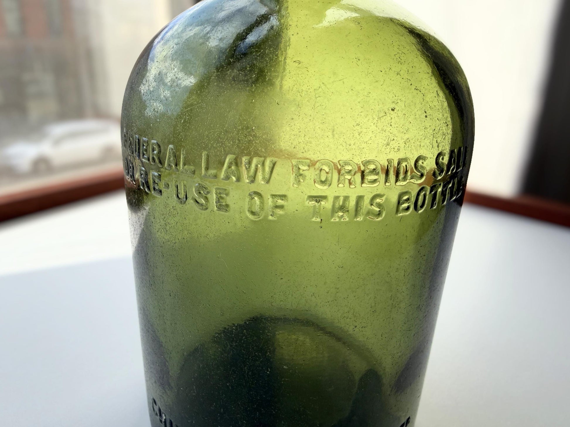 Vintage Chivas Brothers olive green scotch bottle, 8.25 inches tall, embossed with Federal Law Forbids Sale Or Re-Use Of This Bottle — hand-recovered NYC mid-century glass dated 1935 to 1964