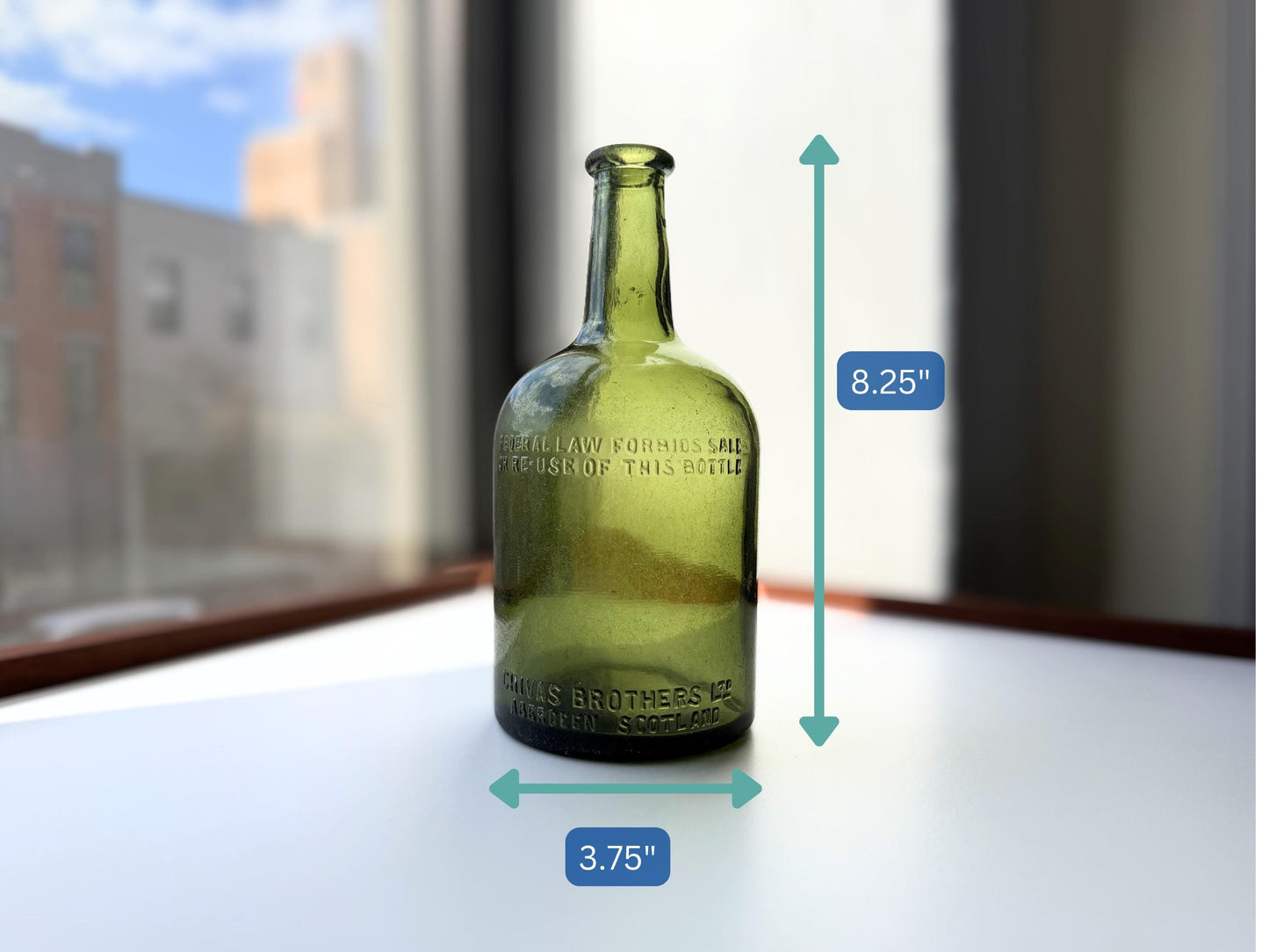 Vintage Chivas Brothers olive green scotch bottle, 8.25 inches tall, embossed with Federal Law Forbids Sale Or Re-Use Of This Bottle — hand-recovered NYC mid-century glass dated 1935 to 1964