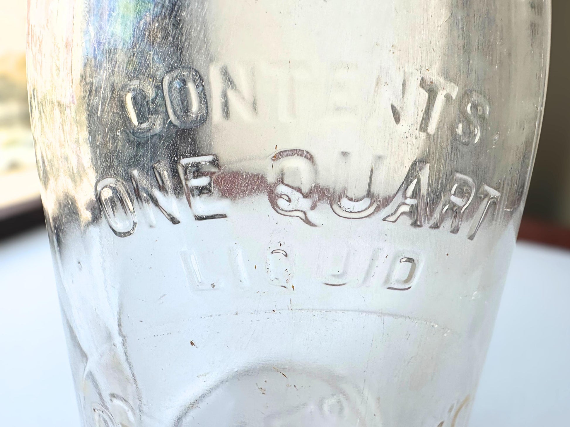 Vintage Crowley's one quart milk bottle with pink tinted glass and embossed Fine Quality lettering. Perfect for farmhouse cottagecore vintage kitchen decor, single stem vase, flower display, or dairy bottle collection. Rescued from NYC beaches.