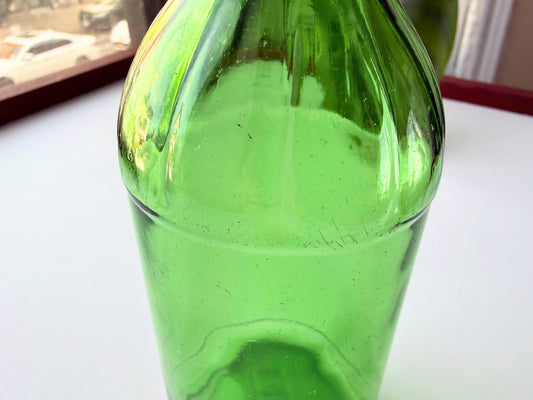 Vintage 1945 green glass beverage bottle from Glenshaw Glass Company with vibrant emerald color. Perfect for bookshelf styling, bud vases, farmhouse decor, and cottagecore displays – Brooklyn Sea Glass