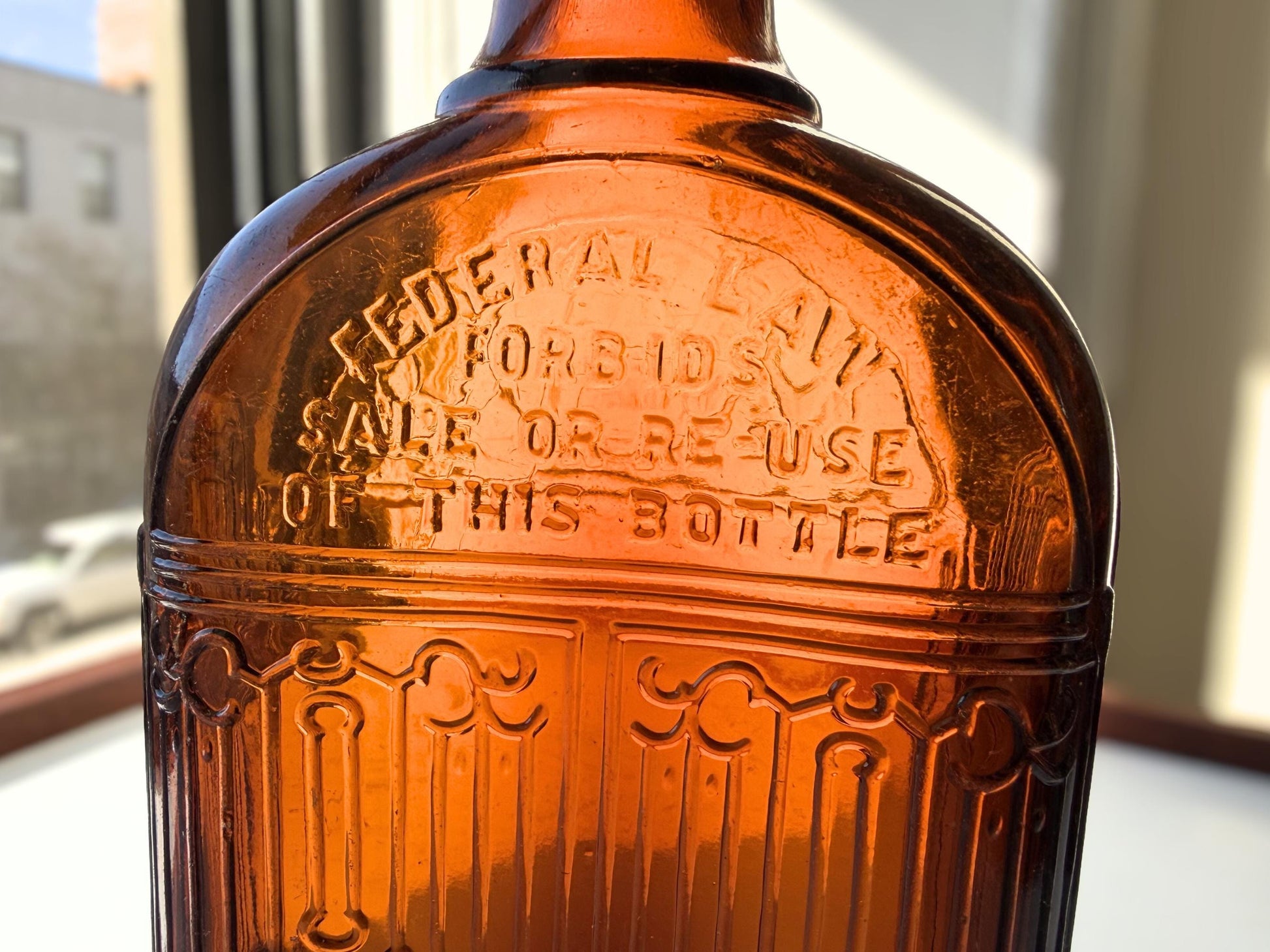 Vintage Hiram Walker amber flask with bottled by Hiram Walker marking. Good condition showing authentic wear. Perfect for spirits collectors and vintage bar displays.