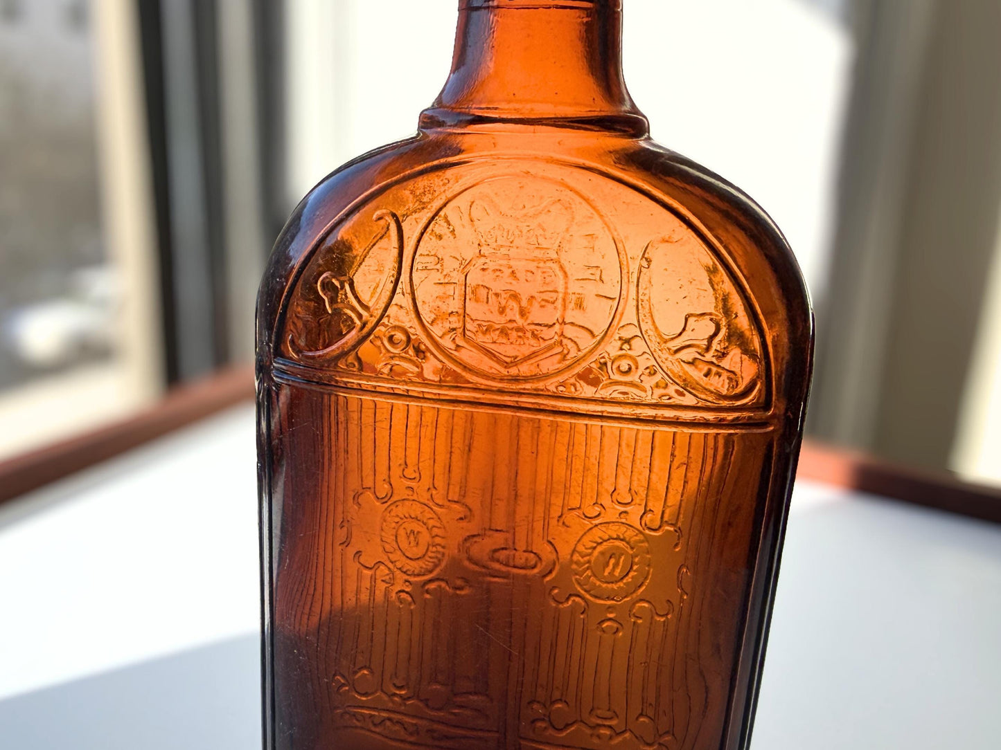 Vintage Hiram Walker amber flask with bottled by Hiram Walker marking. Good condition showing authentic wear. Perfect for spirits collectors and vintage bar displays.