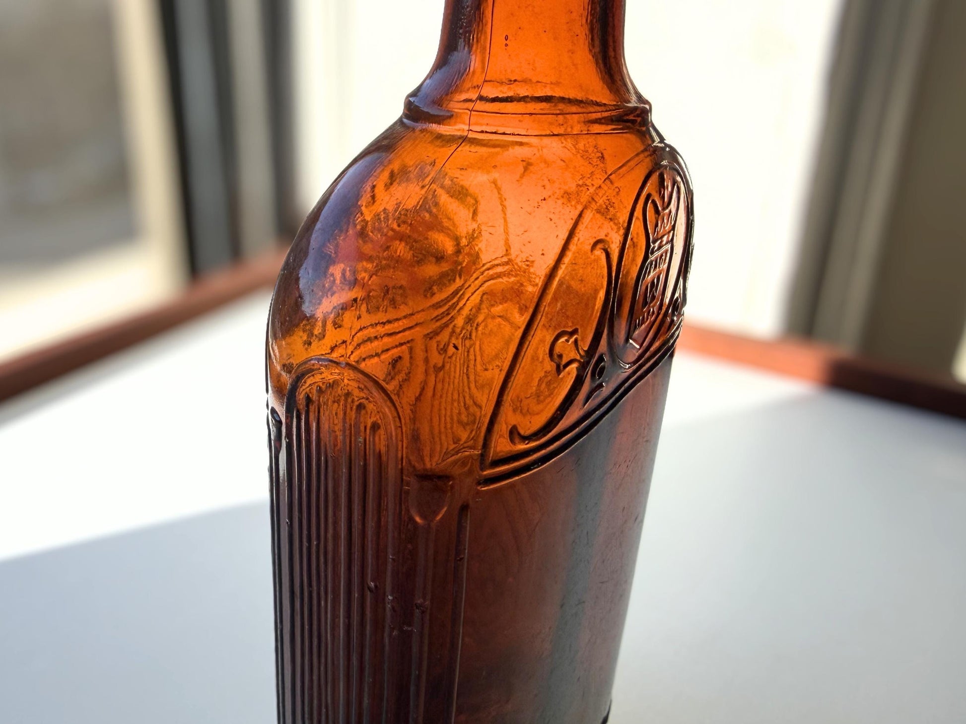 Vintage Hiram Walker amber flask with bottled by Hiram Walker marking. Good condition showing authentic wear. Perfect for spirits collectors and vintage bar displays.